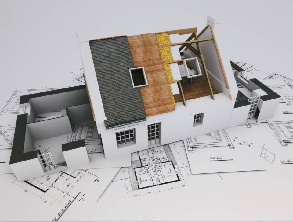 3D-kuva talosta, jossa näkyy eri rakennusmateriaalien kerrokset.